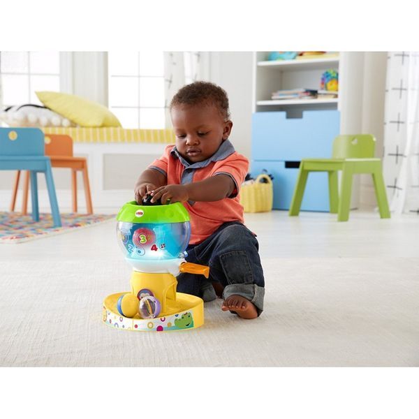 Музыкальная игрушка с шариками Fisher-Price "Автомат со сладостями" DMC46 566458 фото